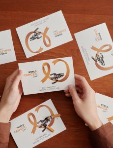 above-angle-of-young-woman-hands-holding-postcard-A8SBC45 (1)